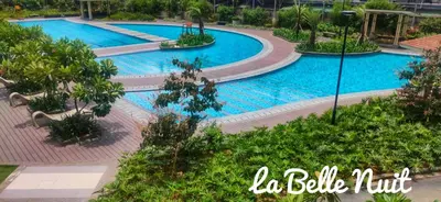 an overhead view of a pool in a resort at Prisma La Belle Nuit in Manila