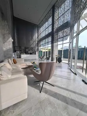 a large living room with a couch and a table at S-Line - Your place, your comfort! in Manila