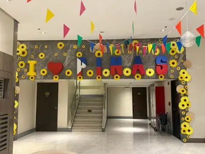 a room with a sign that says i love at 81 Newport Boulevard across NAIA T3 Airport in Manila