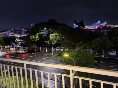 a view of a parking lot at night at 2 BEDROOM SHELL RESIDENCES MOA view in Manila