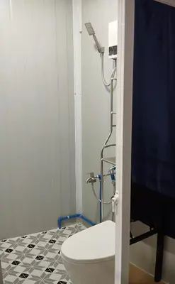 a bathroom with a toilet and a shower at 6 Guest - Unit 6 Studio type - Container house in Pasong Mannga