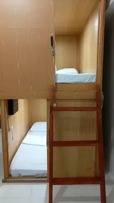 a pair of bunk beds in a room at Capsule88 Hotel in Manila