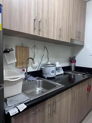 a kitchen with a sink and a toaster on the counter at Amazing view in Shore 2 Residences by Richnells in Manila