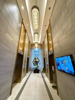 a hallway with a statue of a woman in a building at Newly-furnished 1BR with Balcony near MRT Mandaluyong in Manila