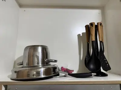 a kitchen counter with knives and a toaster at Room 643 Pool View Shore 2 Residences near PICC & SM MOA by Prime Stay in Manila