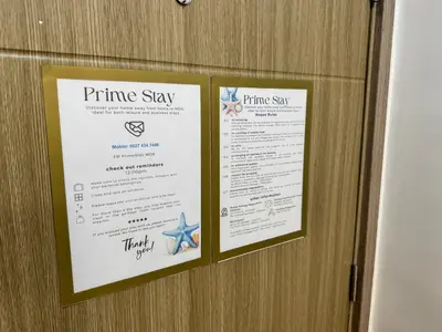 two signs hanging on a door with a dining at Coffee Room 1666 Shore 2 Residences Tower 1 Pool View by Prime Stay MOA in Manila