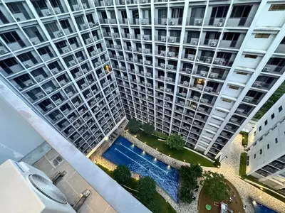 an overhead view of a large apartment building with a pool at Coffee Room 1666 Shore 2 Residences Tower 1 Pool View by Prime Stay MOA in Manila