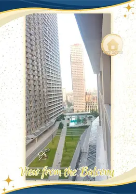 a view from the balcony of a building at Condo with Pool and Balcony near Megamall Ortigas Center in Manila