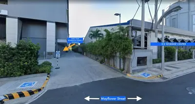 an empty street in front of a building at Condo with Pool and Balcony near Megamall Ortigas Center in Manila