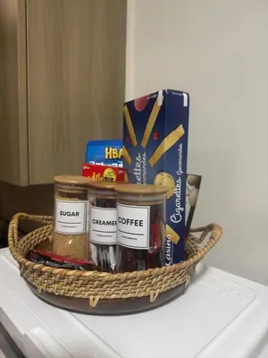 a basket of food and snacks on top of a refrigerator at Erin Serenity Harbor in Manila