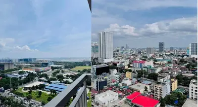 a view of a city from a building at Cozy 1 Bedroom near MOA in Manila