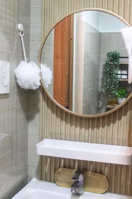 a bathroom with a mirror and a sink at Japandi - Inspired Staycation MOA Pasay City in Manila