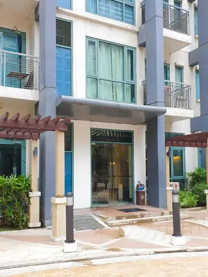a building with the entrance to a building at Layover Stay Condotels at Two Palm Tree Villas in Manila