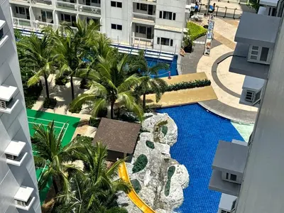 an aerial view of a swimming pool in a building at Sunny side Cityscape C2 RM 1716 Shore Residences by Prime Stay MOA in Manila