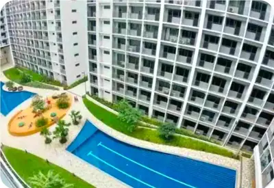 a rendering of an apartment building with a swimming pool at Shore 2 Tower 1 MOA MallofAsia ARENA IKEA NAIA 685 in Manila