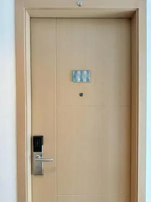 a wooden door with a sign on it at New Cozy 2-bedroom deluxe condo for 5 pax in MOA in Manila