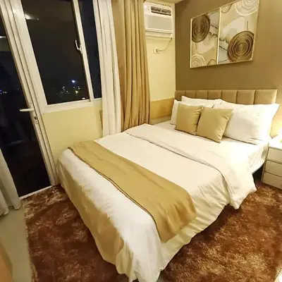 Lovers' Cozy 1BR Condo Near Mall and Airport with Free Netflix Premium and 100 MBPS WiFi