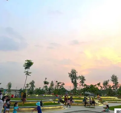 a group of people walking around a park at Enzo vibes in Manila