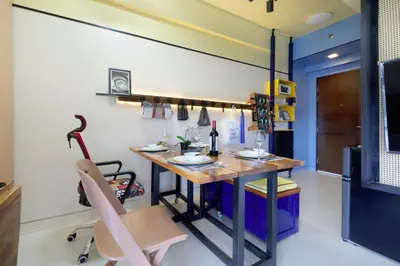 a dining room with a table and a chair at Starwars Retreat Gaming & 84 inch Movie & Near Mall in Manila