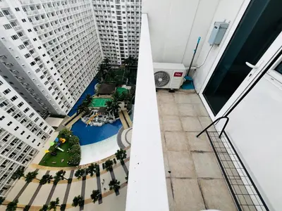 an overhead view of a city with tall buildings at MOA GRAND STAY Suite #05 Spacious Unit & Sun Rise View in Manila