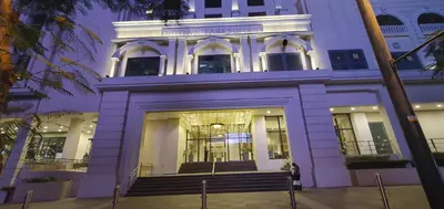 a large white building with stairs in front of it at 1BR at the FORT BGC near Malls, Restaurants & Shops in Manila
