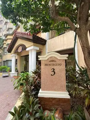 a sign in front of a building at 1 bedroom condo unit for 4 with balcony, pool, WIFI at Newport across NAIA T3 in Manila