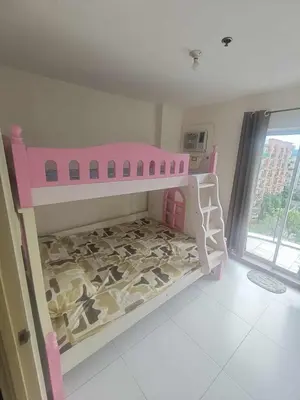 a bedroom with a bunk bed with a herd of sheep at Chateau Elysee in Manila