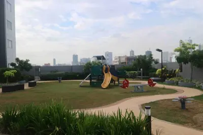 a park with a playground with a swing at Dreamy Studio with Netflix and High Speed Wifi in Manila
