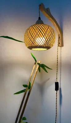 a lamp with a plant hanging from it at Celebrity Stays in Manila