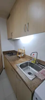 a kitchen with a sink and a counter top at Soap's Haven Rental Unit in Paranaque in Manila
