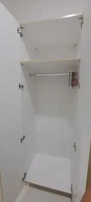 a room with white walls and white shelves at Soap's Haven Rental Unit in Paranaque in Manila