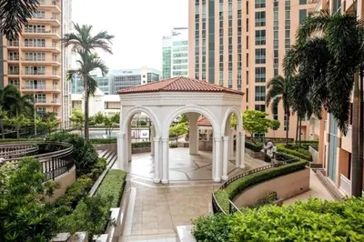 a white gazebo in the middle of a city at Cozy & Spacious 2BR Stay Near BGC - Home Theater in Manila