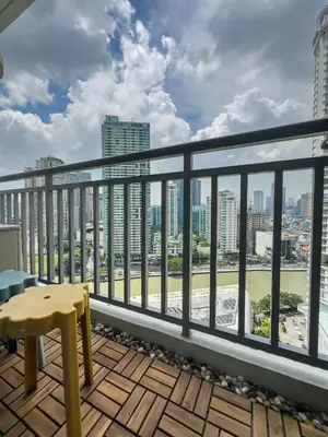 a balcony with a view of the city at Unique and Quiet Studio Unit in Mandaluyong or Makati with Fast WiFi & Best City View in Manila