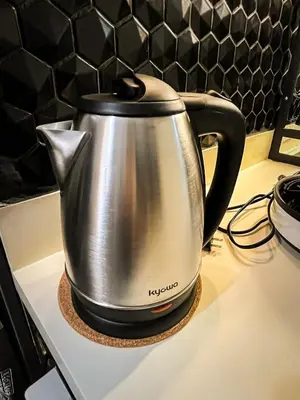 a tea kettle sitting on top of a counter at Dibuho Studio in Manila