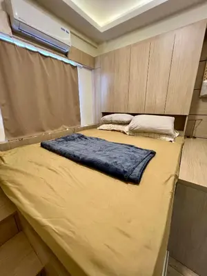 a large bed in a small room with a mattress at SRR NAIA T3 - Month of January - New Year PROMO Php 1,999 - 1 BR Interior Designed Unit in Manila