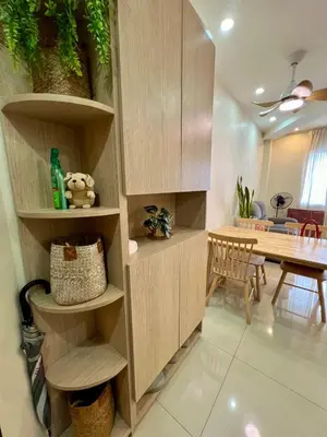 a room with a table and a dining room at SRR NAIA T3 - Month of January - New Year PROMO Php 1,999 - 1 BR Interior Designed Unit in Manila