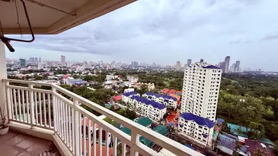 a view of a city from the balcony of a building at Vista Shaw Residences in Manila