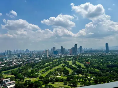 an aerial view of a city with tall buildings at Vista Shaw Residences in Manila