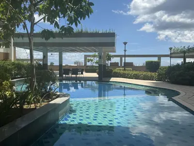 a swimming pool with a gazebo in a resort at Levi & Moon's Chill with beautiful view in Manila