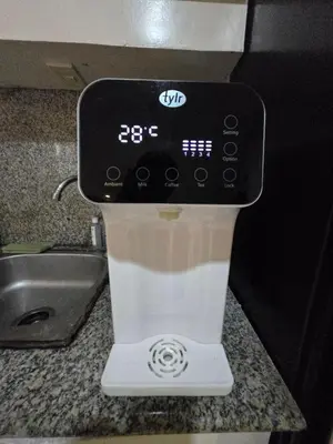 a cup of coffee is sitting on a counter at Condo 2 bedroom victoria de makati in Manila