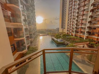 a view of a river from a balcony of a building at Radiance Manila bay 2 br & 3 bath in Manila