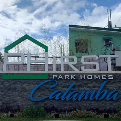 a sign for a park homes calanta sign at A peace and quiet home away from your home in Calamba