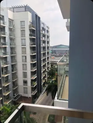 a view from the balcony of a apartment building at Sun Property in Manila