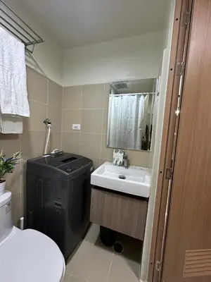 a small bathroom with a toilet and a sink at jastmypads and staycation in Manila