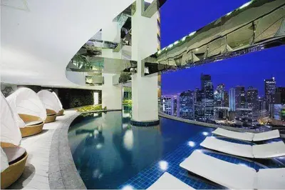 a house with a swimming pool with a city skyline at E-Studio,Best Sunset Pool,Luxury,Hotel Style in Manila