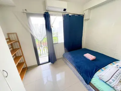 a small room with a bed and a window at SHORE 2 TOWER 2 7th floor Near MOA Easy Vacation Shopping Center in Manila