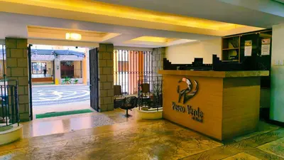 a lobby of a new drugstore with a sign on the counter at Cozy Corner at Paseo Verde with Free On-Site Private Parking in Manila