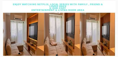 a living room with couches and a flat screen tv at Eu & El Cozy Condo in Manila
