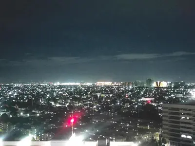 a view of a city at night with a red light at JAZZ staycation in Manila