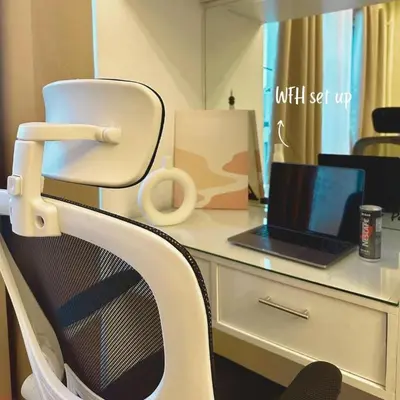 a desk with a chair with a laptop on it at JAZZ staycation in Manila